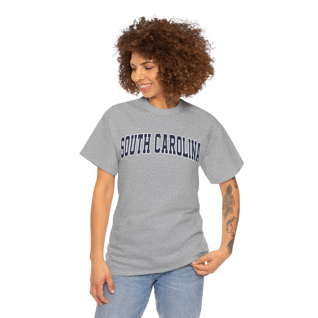 Woman wearing a gray 'South Carolina' t-shirt on a white background