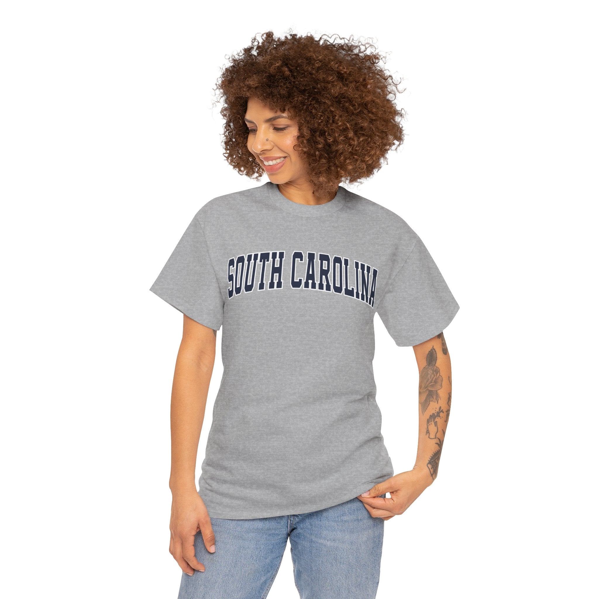 Woman wearing a gray 'South Carolina' t-shirt on a white background