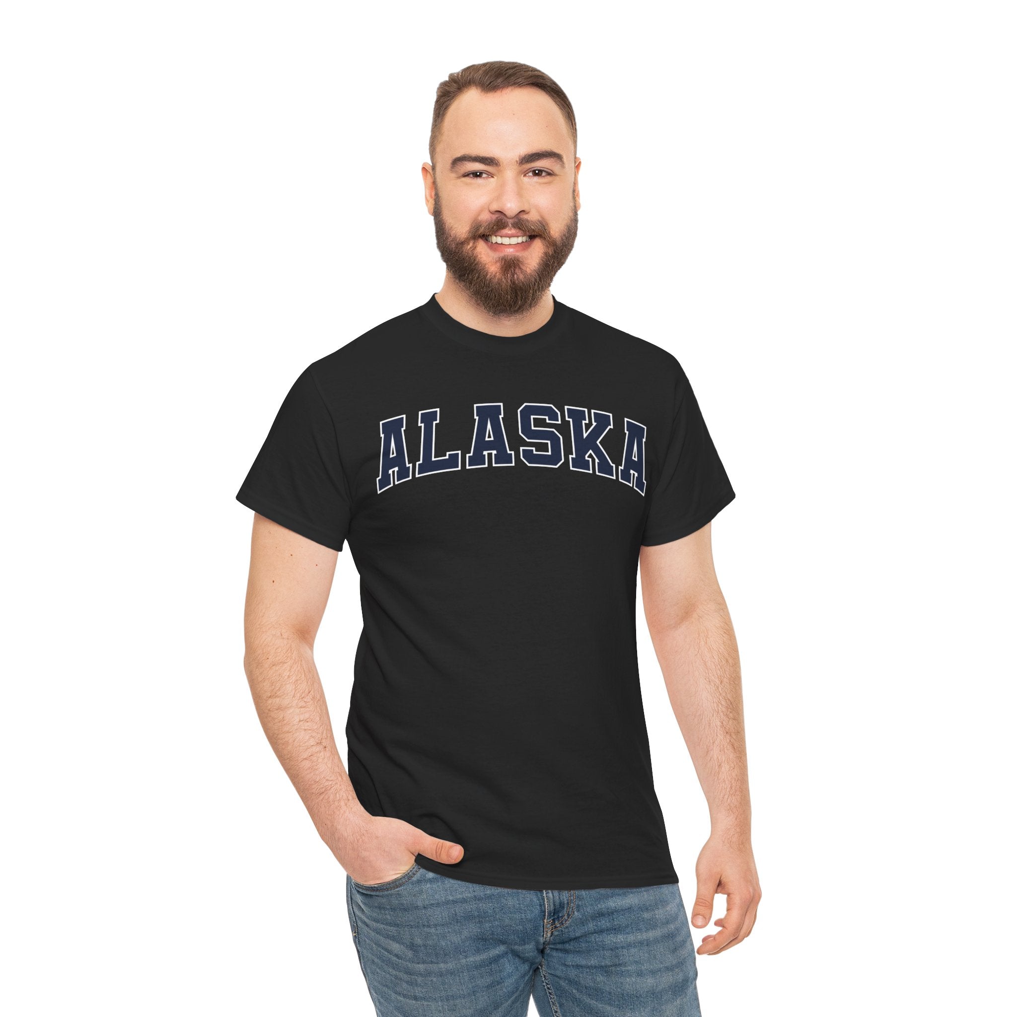 Man wearing a black t-shirt with 'ALASKA' text on a white background