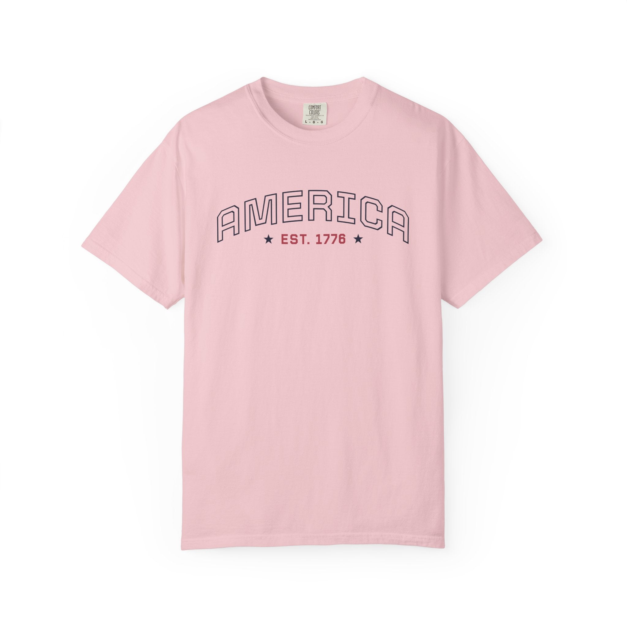 Blossom t-shirt with 'AMERICA EST. 1776' typography design in varsity style on a white background