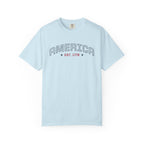 Chambray t-shirt with 'AMERICA EST. 1776' typography design in varsity style on a white background
