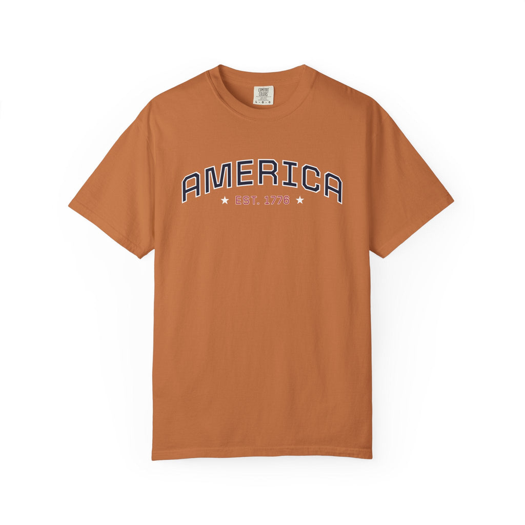 Yam t-shirt with 'AMERICA EST. 1776' typography design in varsity style on a white background