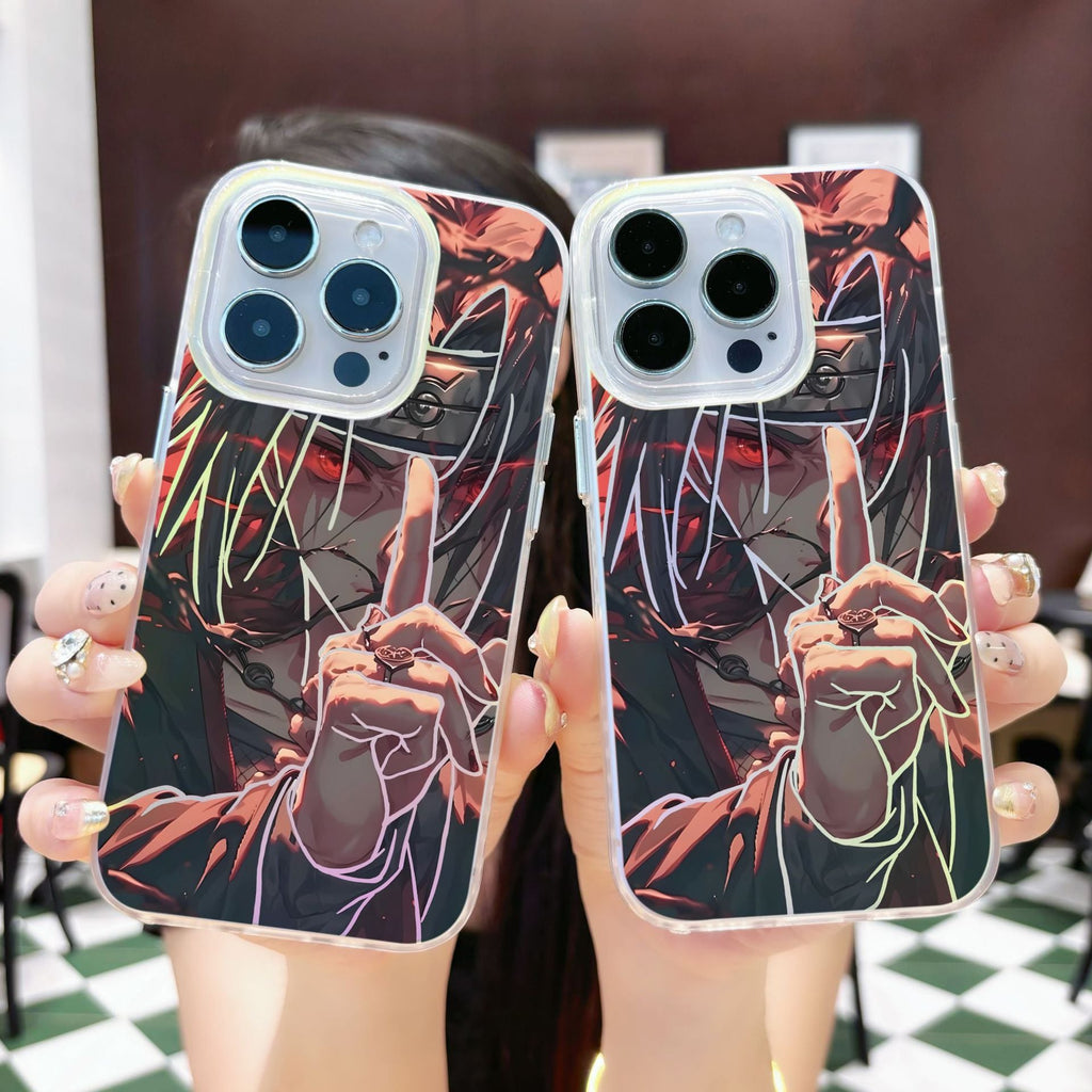 Two phone cases with an anime Naruto Shippuden Uchiha Itachi design of a hand making a jutsu sign held by a person.