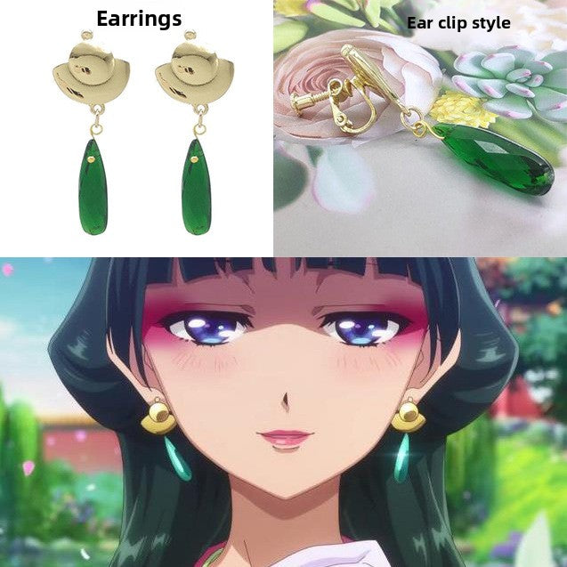 Earrings with green stones and gold accents, shown on a character with long dark hair and purple eyes, Maomao from The Apothecaru Diaries Anime.