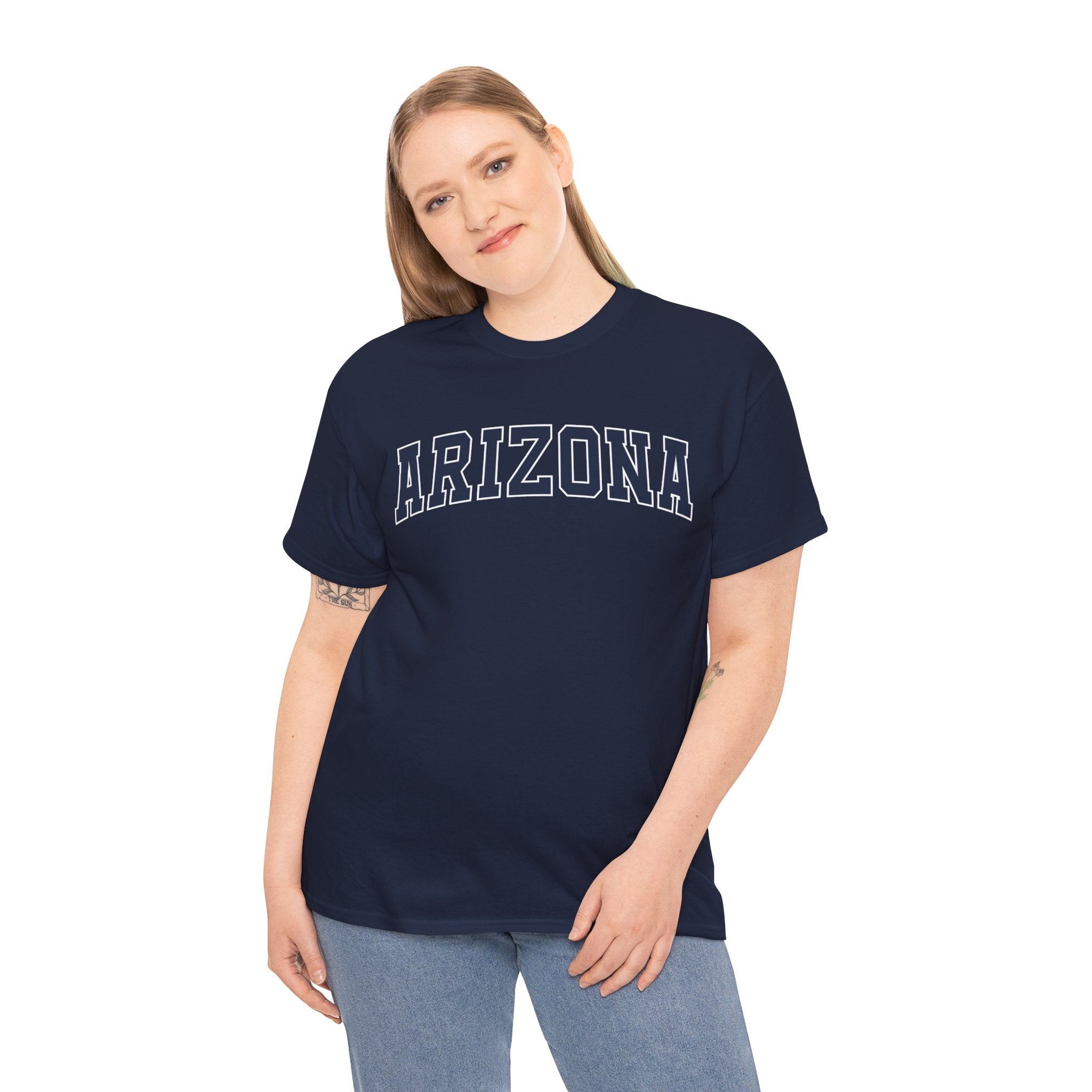 A woman wearing a navy t-shirt with 'ARIZONA' typography design in varsity style on a white background