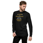 Man wearing a black long-sleeve shirt with yellow witty otaku anime text on a white background