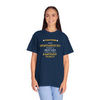 Person wearing a navy blue t-shirt with yellow otaku text on a white background