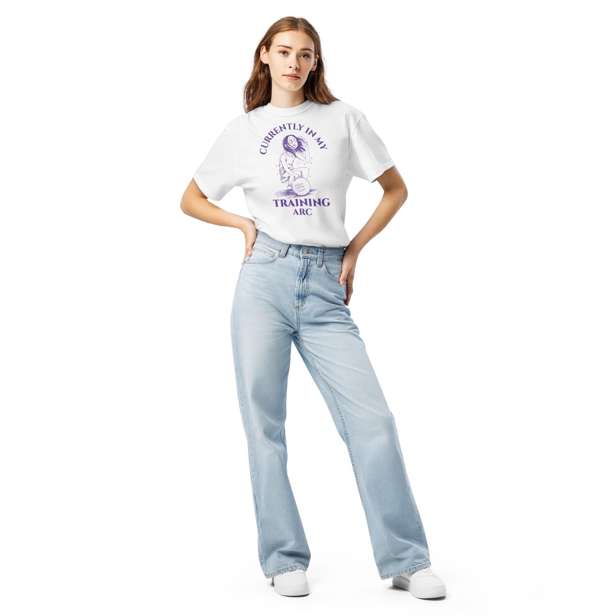 Woman wearing a white t-shirt with a currently in my training arc anime graphic design and text on a white background