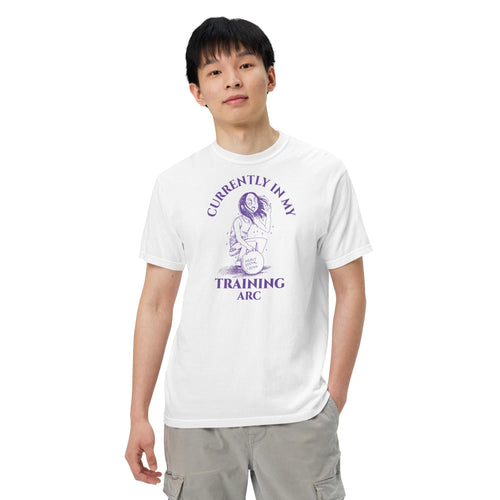 Person wearing a white t-shirt with a currently in my training arc anime graphic design and text on a white background