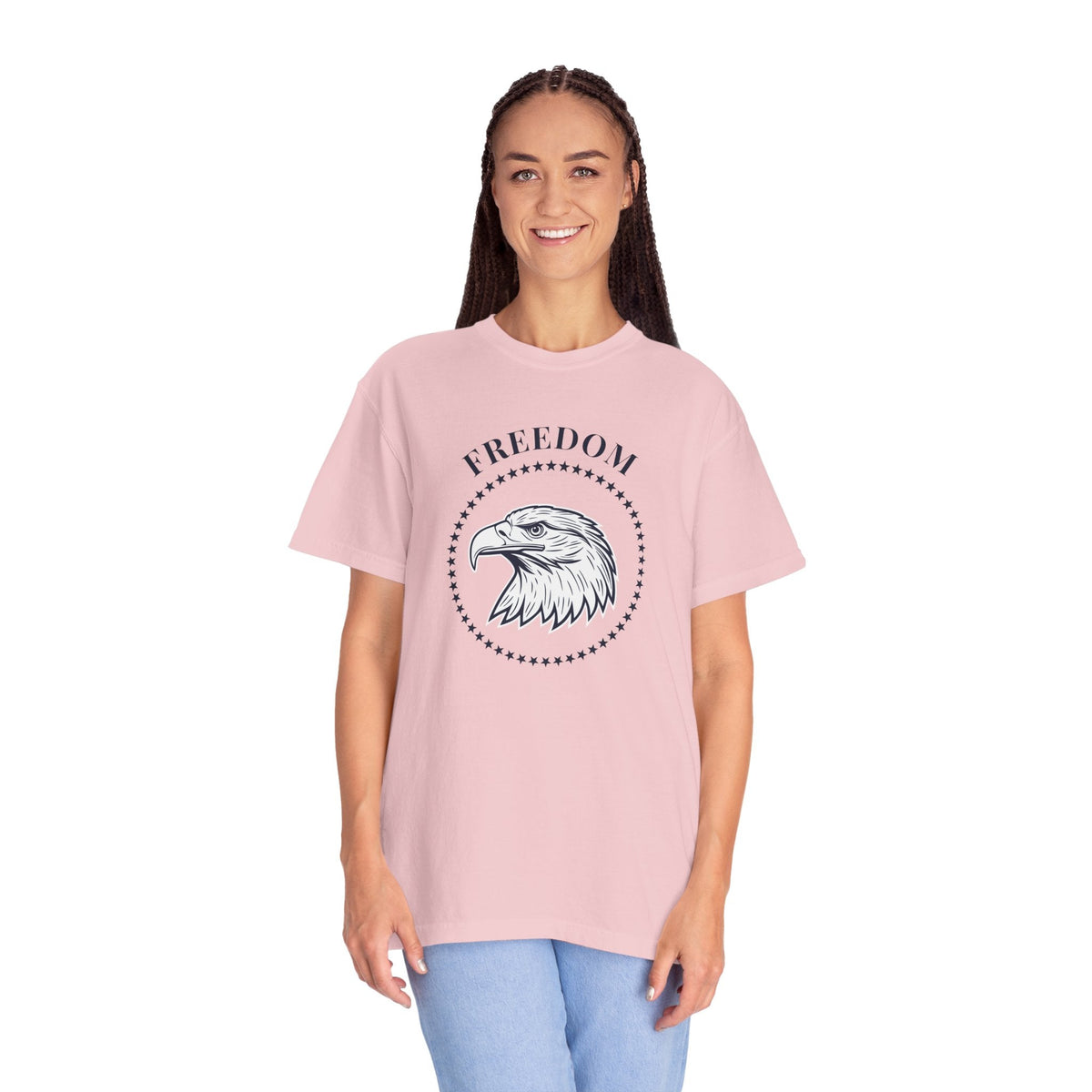 a woman wearing a pink t-shirt with the eagle freedom and starts graphic design on a white background.