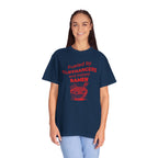 Person wearing a navy t-shirt with red otaku text and ramen graphic on a white background