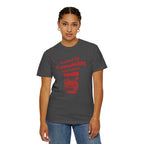 Person wearing a graphite t-shirt with red otaku text and ramen graphic on a white background