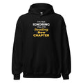 Black hoodie with a funny text 'I'm Not Ignoring You, I'm Reading a New Chapter' on a white background