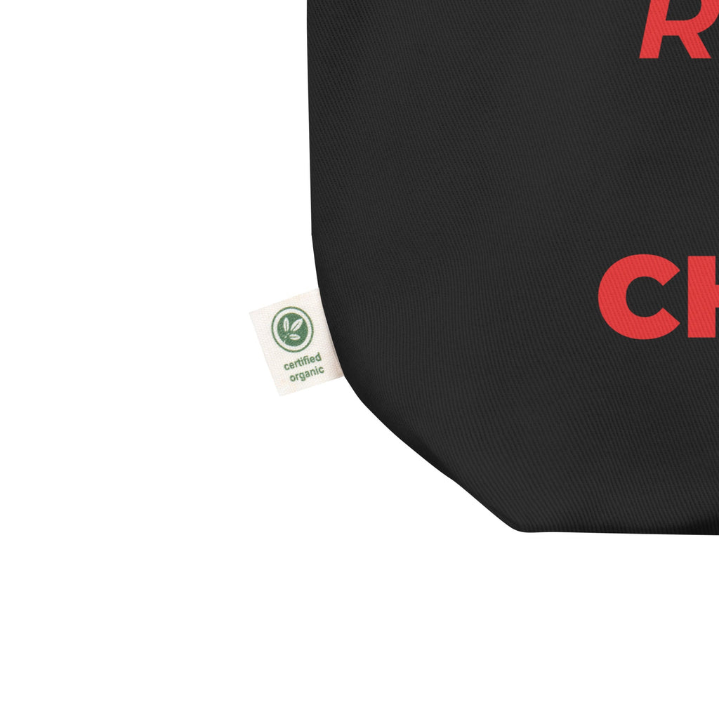 Black bag with red text and a visible organic certification tag on a white background