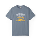 Blue Jean t-shirt with text 'I'm Not Ignoring You, I'm Reading the New Chapter' on a white background