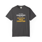 Graphite t-shirt with text 'I'm Not Ignoring You, I'm Reading the New Chapter' on a white background