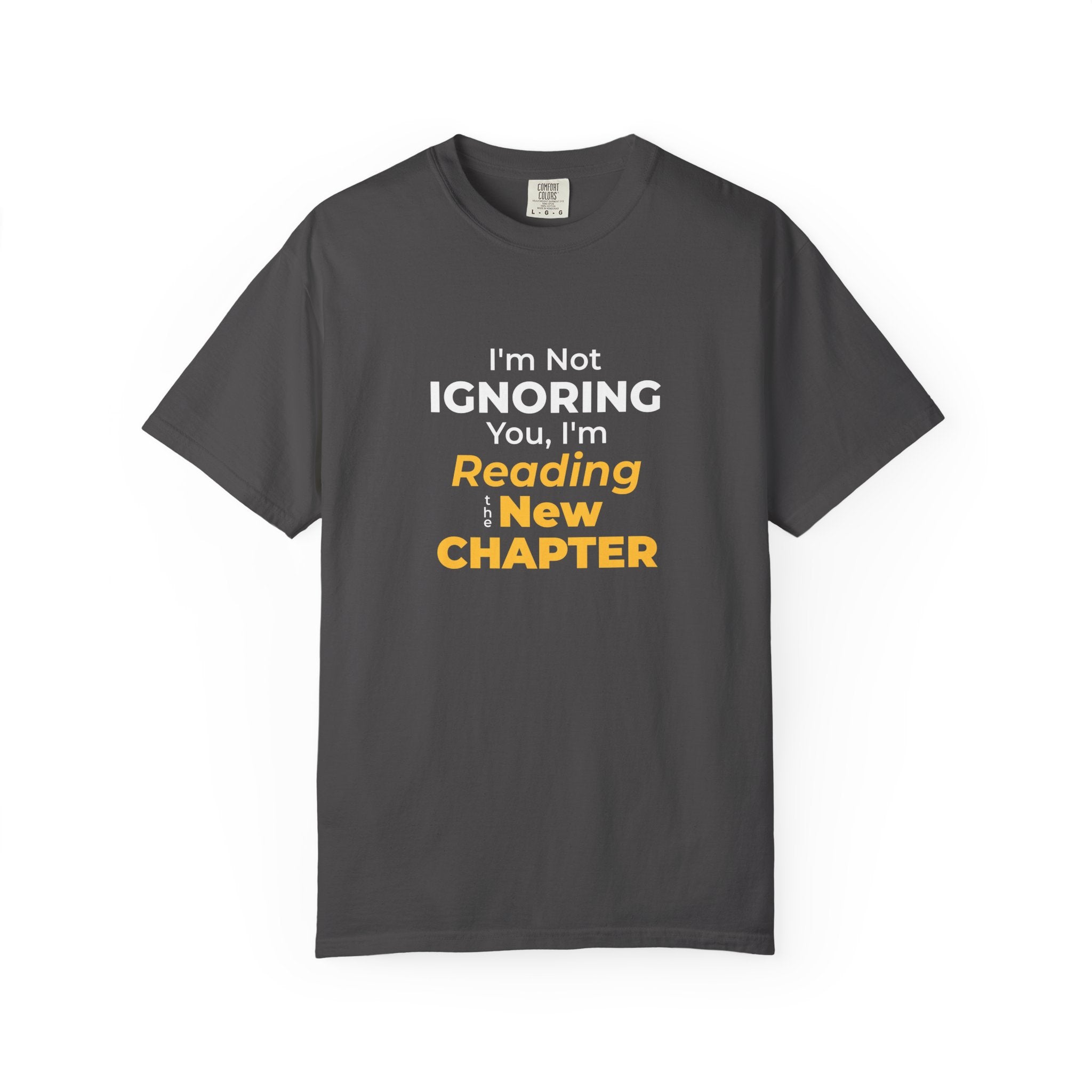 Graphite t-shirt with text 'I'm Not Ignoring You, I'm Reading the New Chapter' on a white background