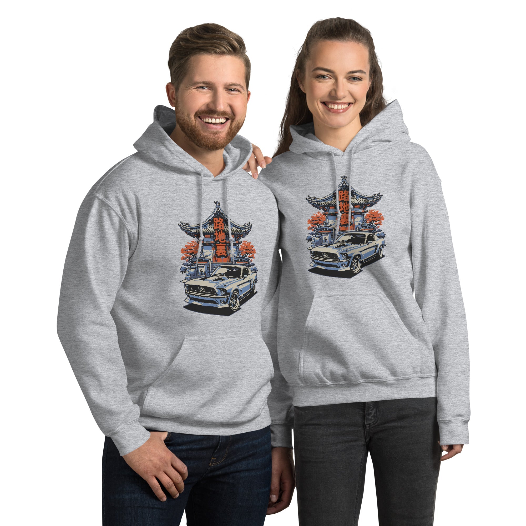 a couple of a man and a woman wearing a matching sport grey hoodie with a japanese retro jdm 90s Car Graphic design against a white background