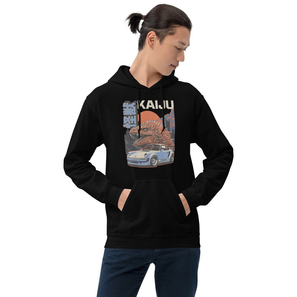 a man wearing a black hoodie with a monster kaiju and Porsche Car vintage Graphic design against a white background