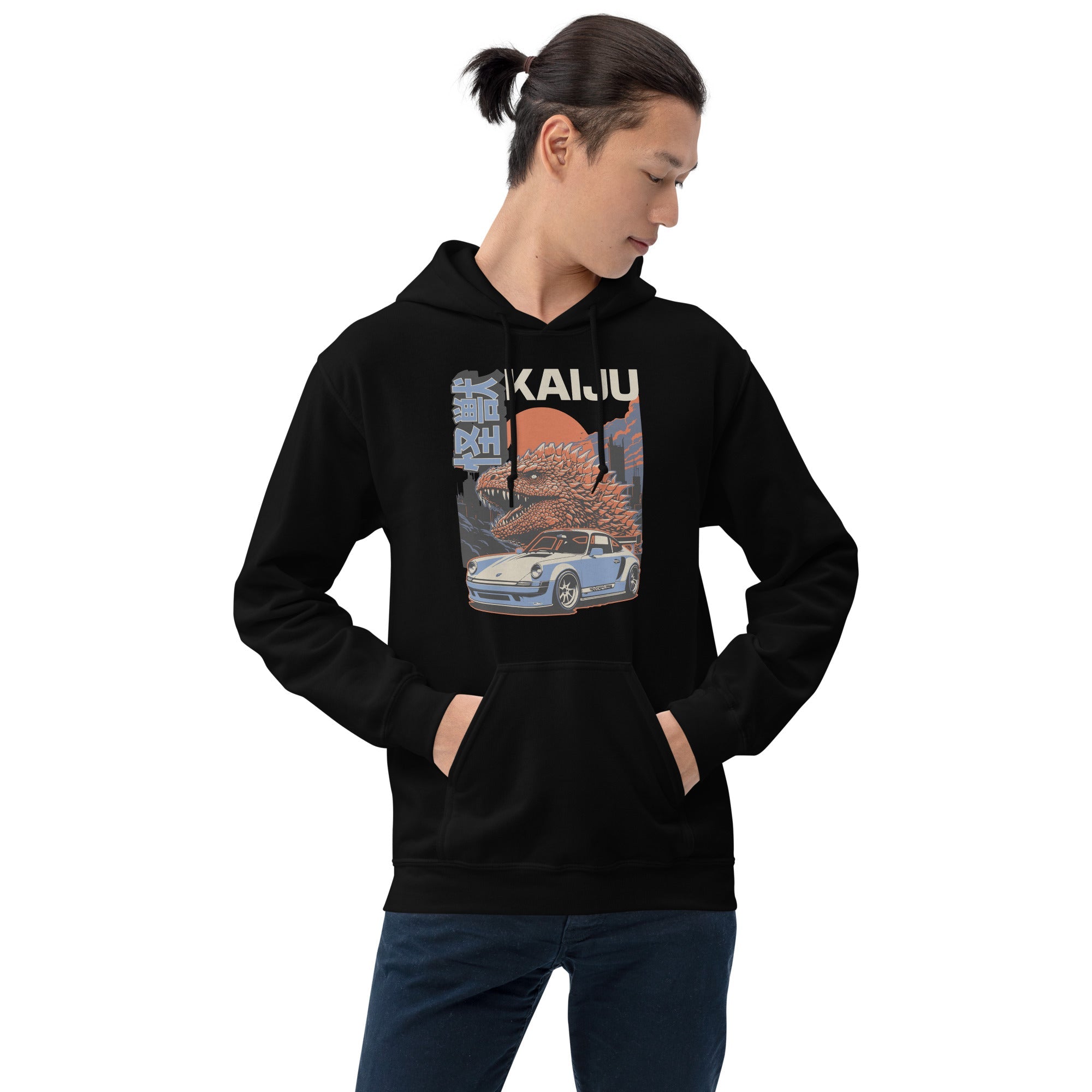 a man wearing a black hoodie with a monster kaiju and Porsche Car vintage Graphic design against a white background
