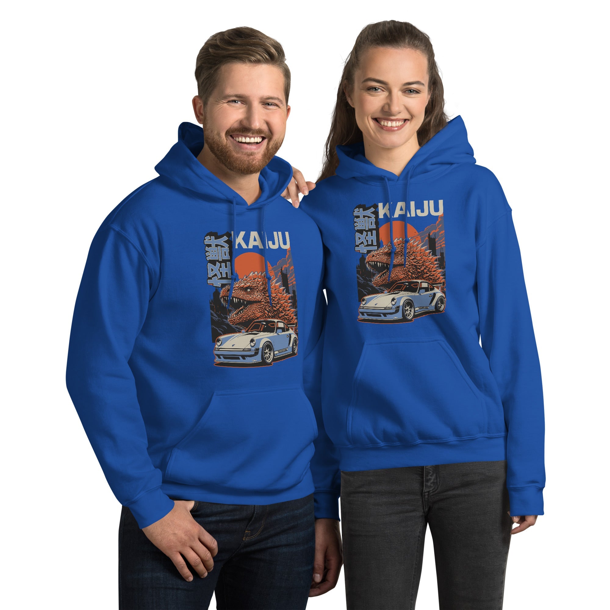 a couple of a man and a woman wearing a macthing royal blue hoodie with a monster kaiju and Porsche Car vintage Graphic design against a white background