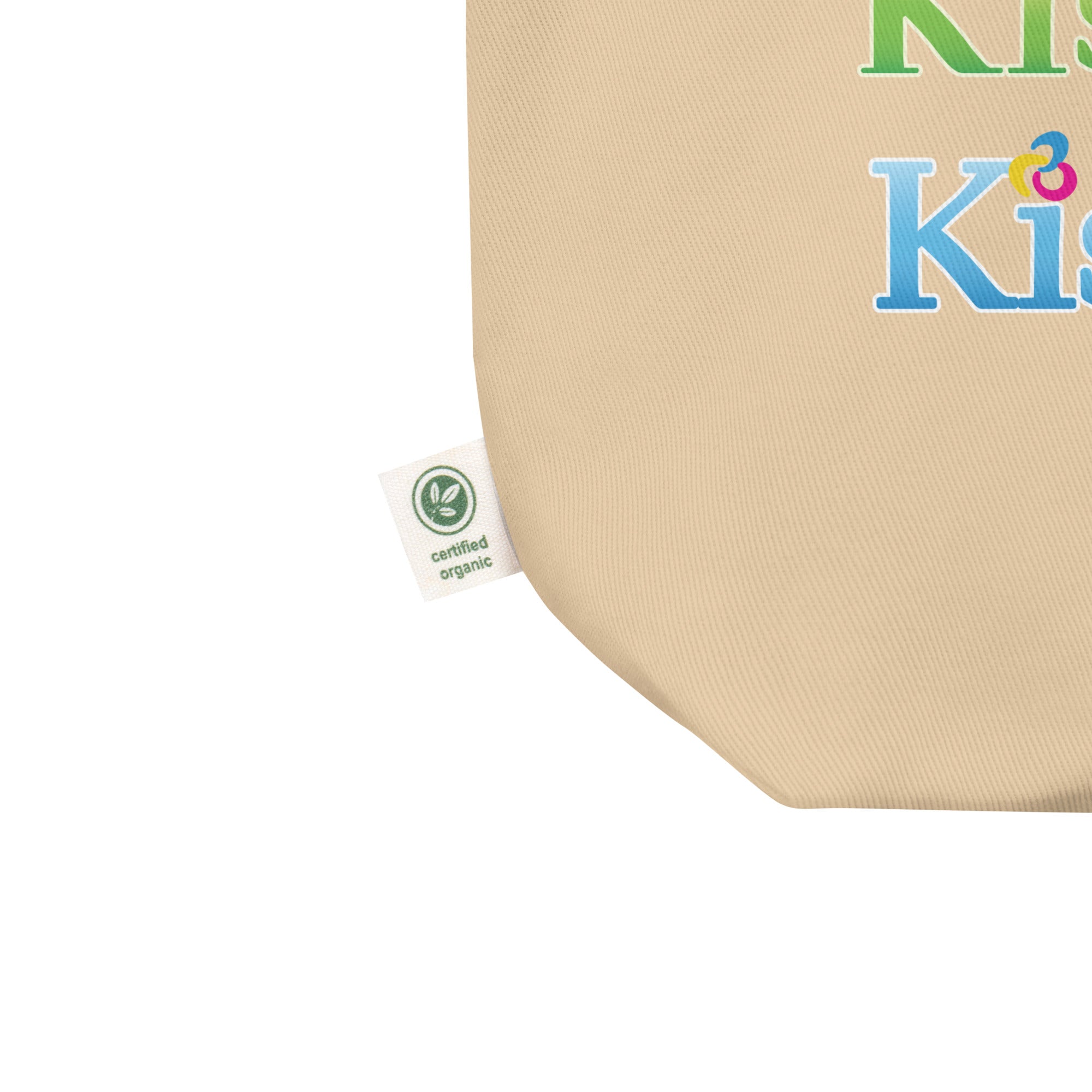 a beige tote bag closed-up view with the certified organic label 