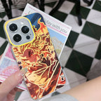 Phone case with anime Kimetsu No Yaiba Demon Slayer Kyojuro Rengoku design held by a hand on a checkered floor.