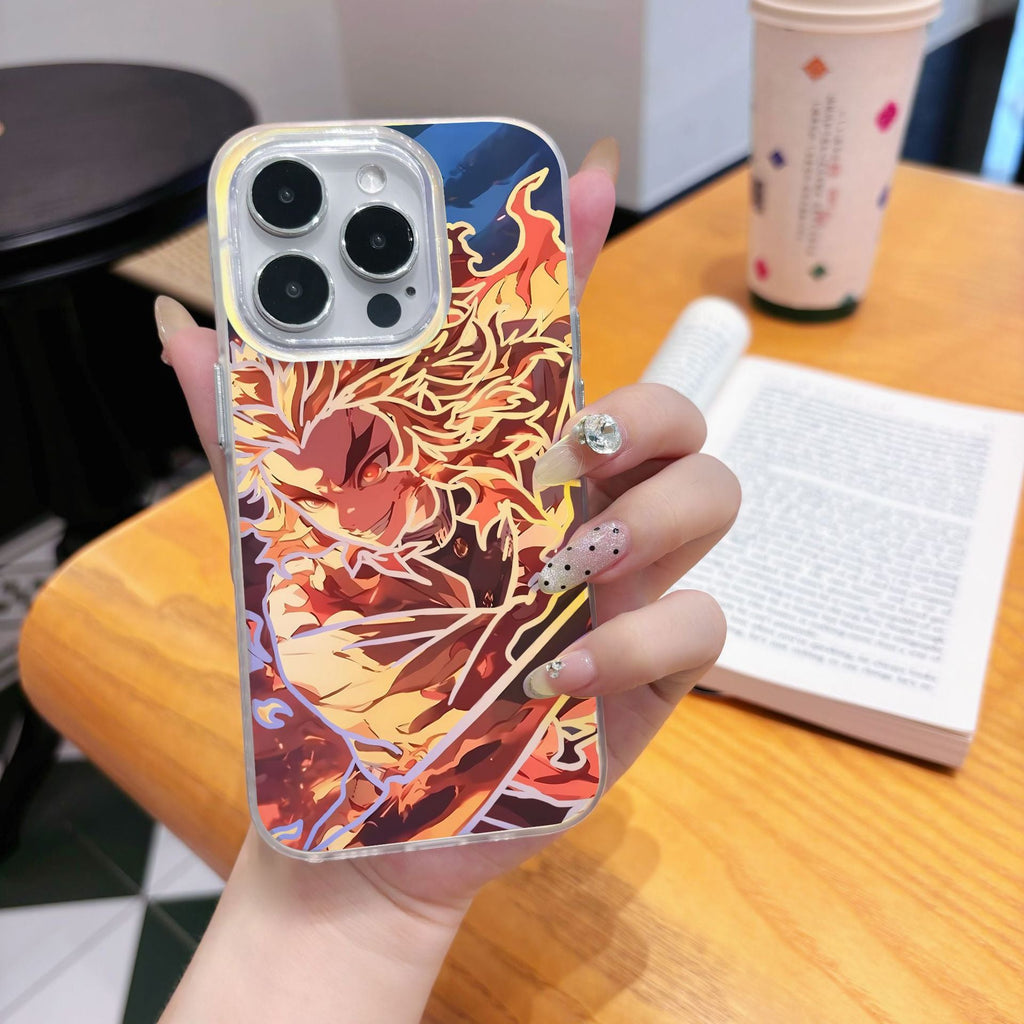 Phone case with anime Kimetsu No Yaiba Demon Slayer Kyojuro Rengoku design held by a hand on a wooden table.