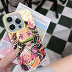 Phone case with colorful anime Kimetsu No Yaiba Demon Slayer Nezuko Kamado design held by a hand on a checkered floor.