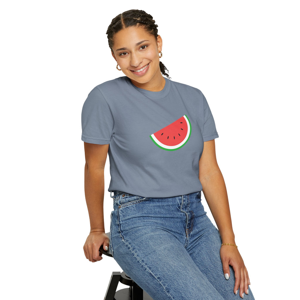 Person wearing a gray t-shirt with a watermelon design on a white background