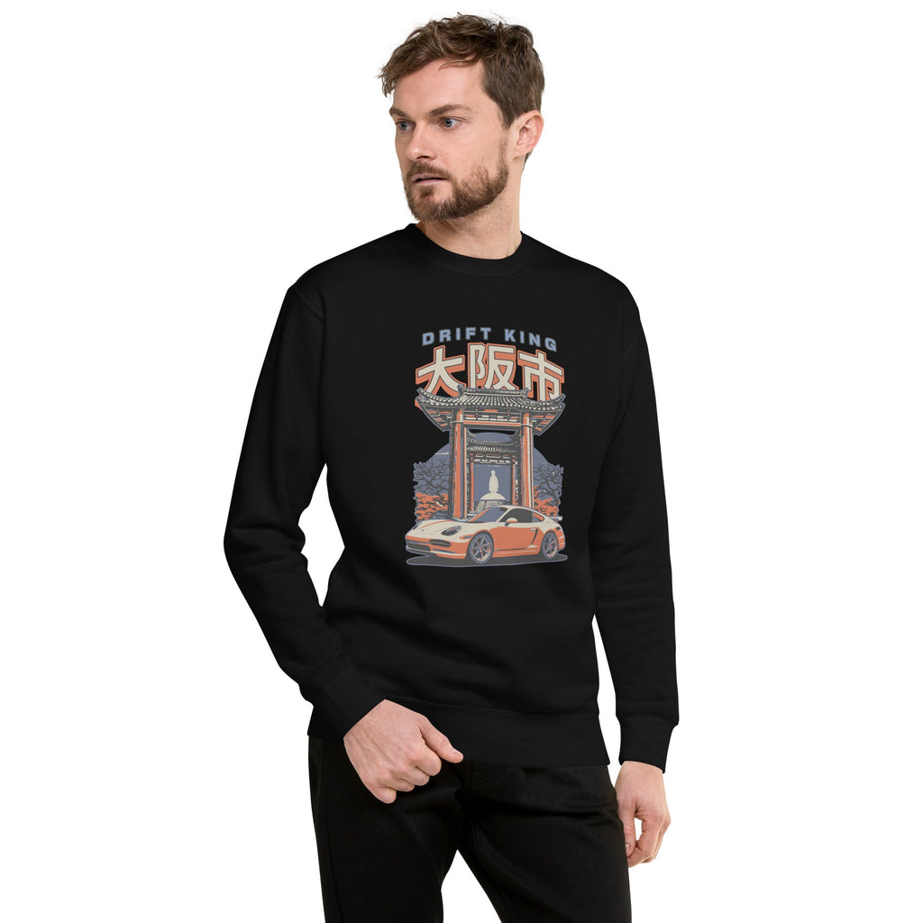 a man wearing a black sweatshirt with a Drift King Japanese Porsche Car Graphic design against a white background