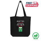 Black tote bag with humorous text and truck-kun graphic, free shipping and eco-friendly badge on a white background