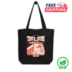 Black tote bag with isekai truck-kun design and 'Free Shipping' and 'Eco' labels on a white background