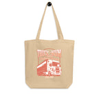 Beige tote bag with red isekai truck-kun graphic and text on a white background