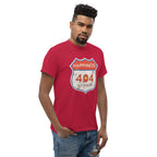 Man wearing a red t-shirt with a 'Happiness 404 Not Found' graphic design on a white background