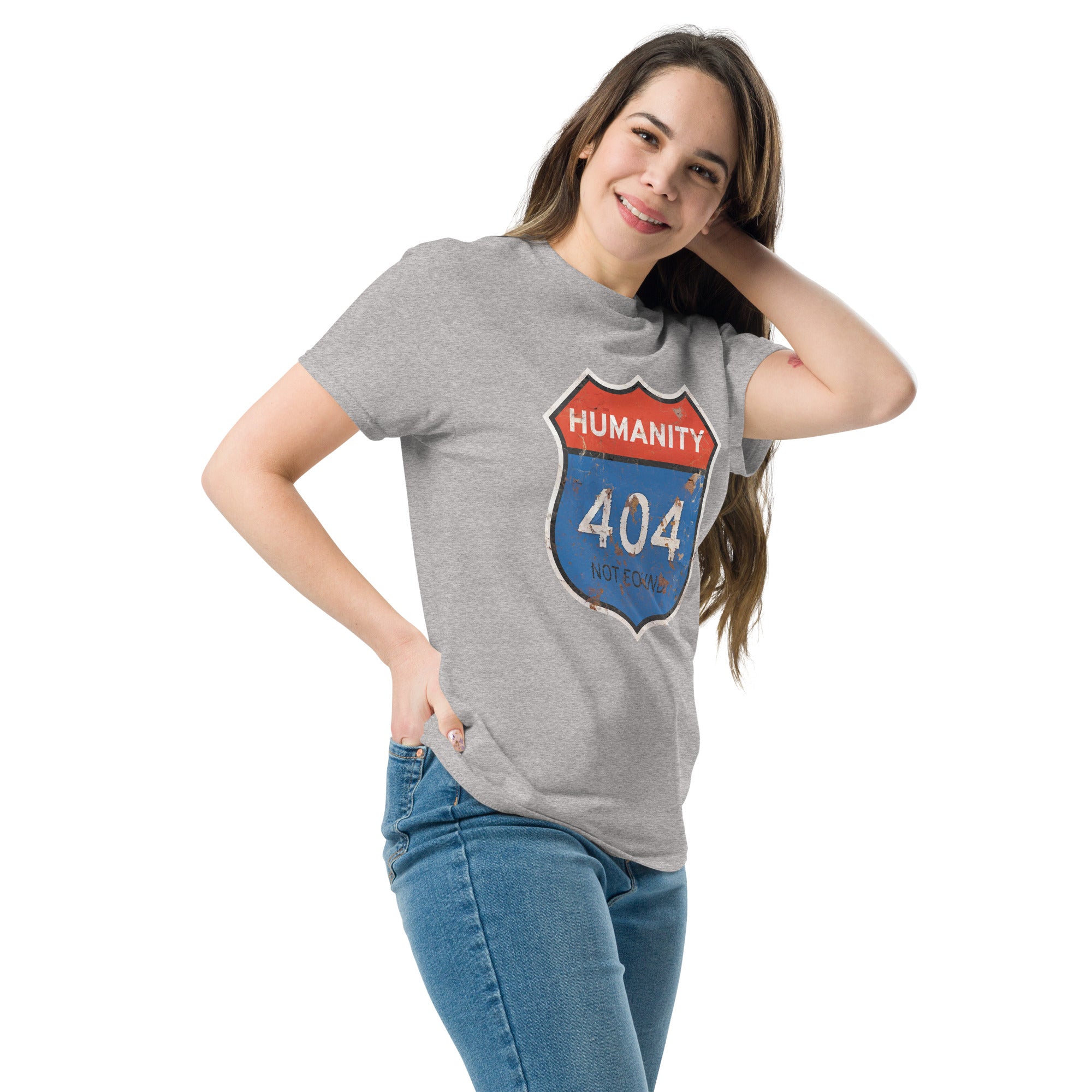 Person wearing a gray t-shirt with a unique 'Humanity 404 Not Found' design on a white background