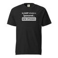 Black t-shirt with funny, witty 'My Sleep Schedule is Sponsored by New Episodes' text design on a white background