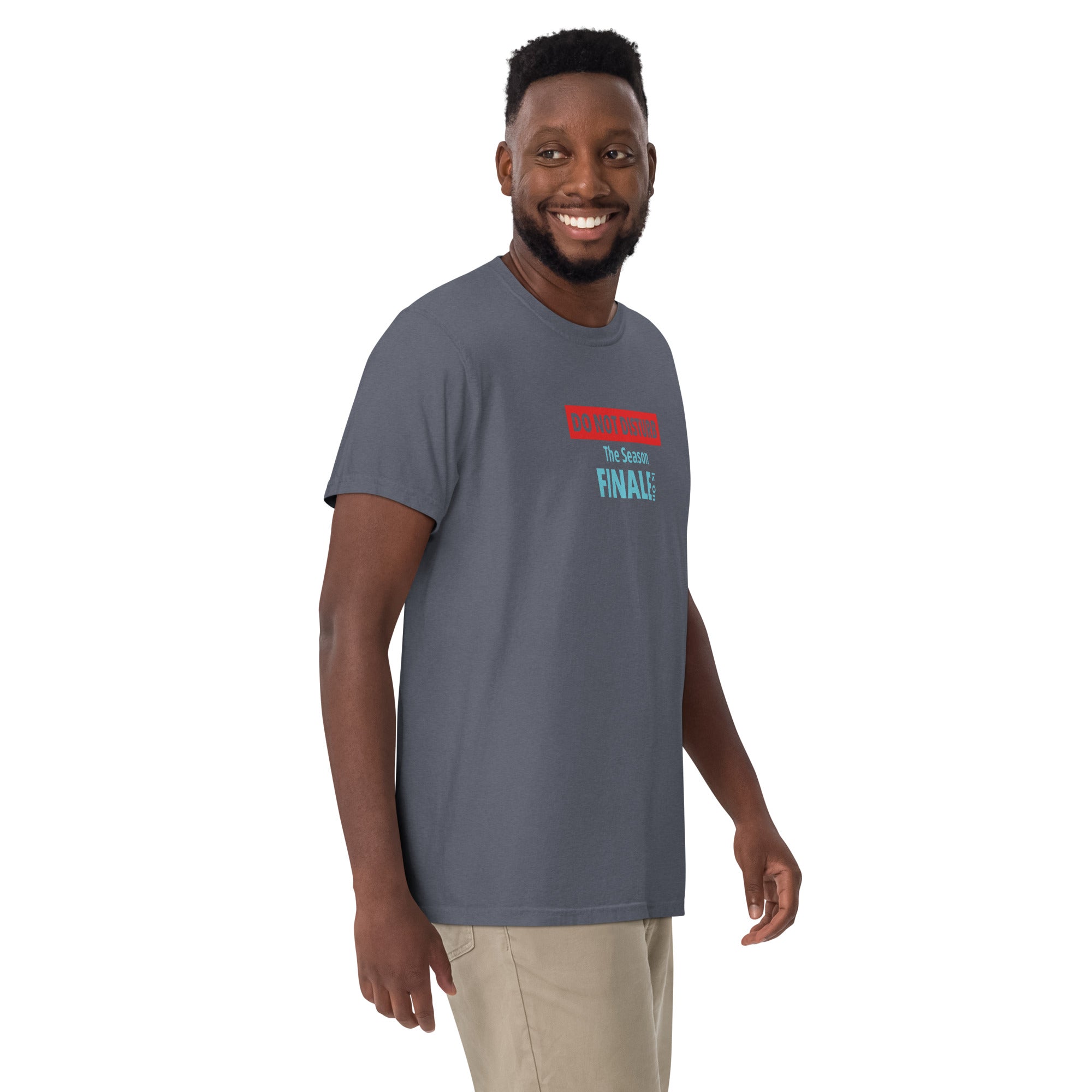 Man wearing a gray t-shirt with text design 'DO NOT DISTURB The Season FINALE is On' on a white background