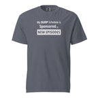 Gray t-shirt with humorous, funny, witty 'My Sleep Schedule is Sponsored by New Episodes' text design on a white background