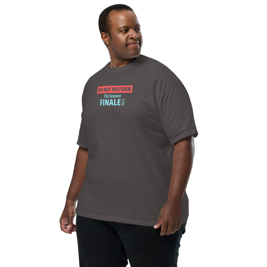 Man wearing a gray t-shirt with text design 'DO NOT DISTURB The Season FINALE is On' on a white background
