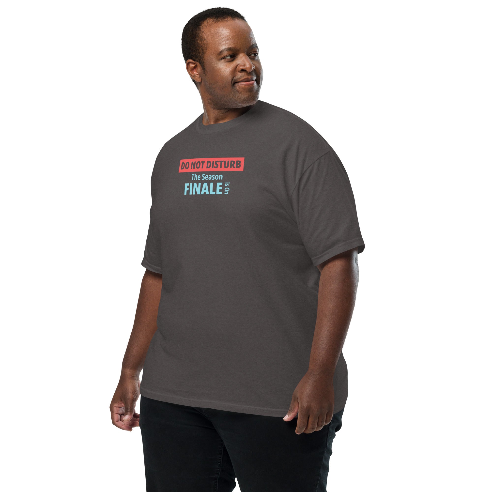 Man wearing a gray t-shirt with text design 'DO NOT DISTURB The Season FINALE is On' on a white background