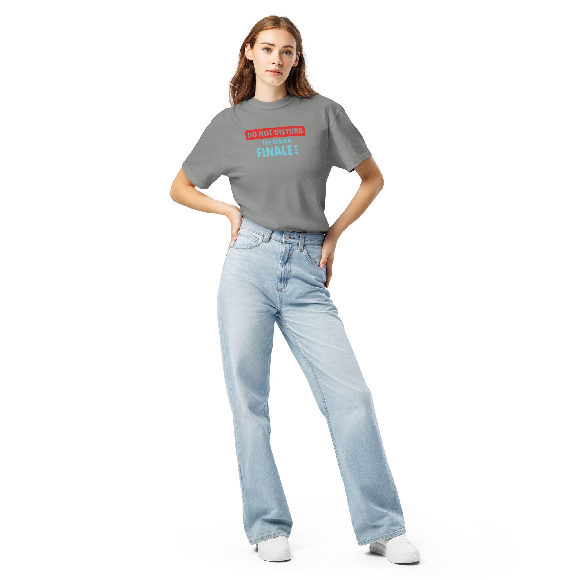 Woman wearing a gray t-shirt with colorful text design 'DO NOT DISTURB The Season FINALE is On' on a white background
