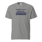 Gray t-shirt with humorous funny, witty 'My Sleep Schedule is Sponsored by New Episodes' text design on a white background