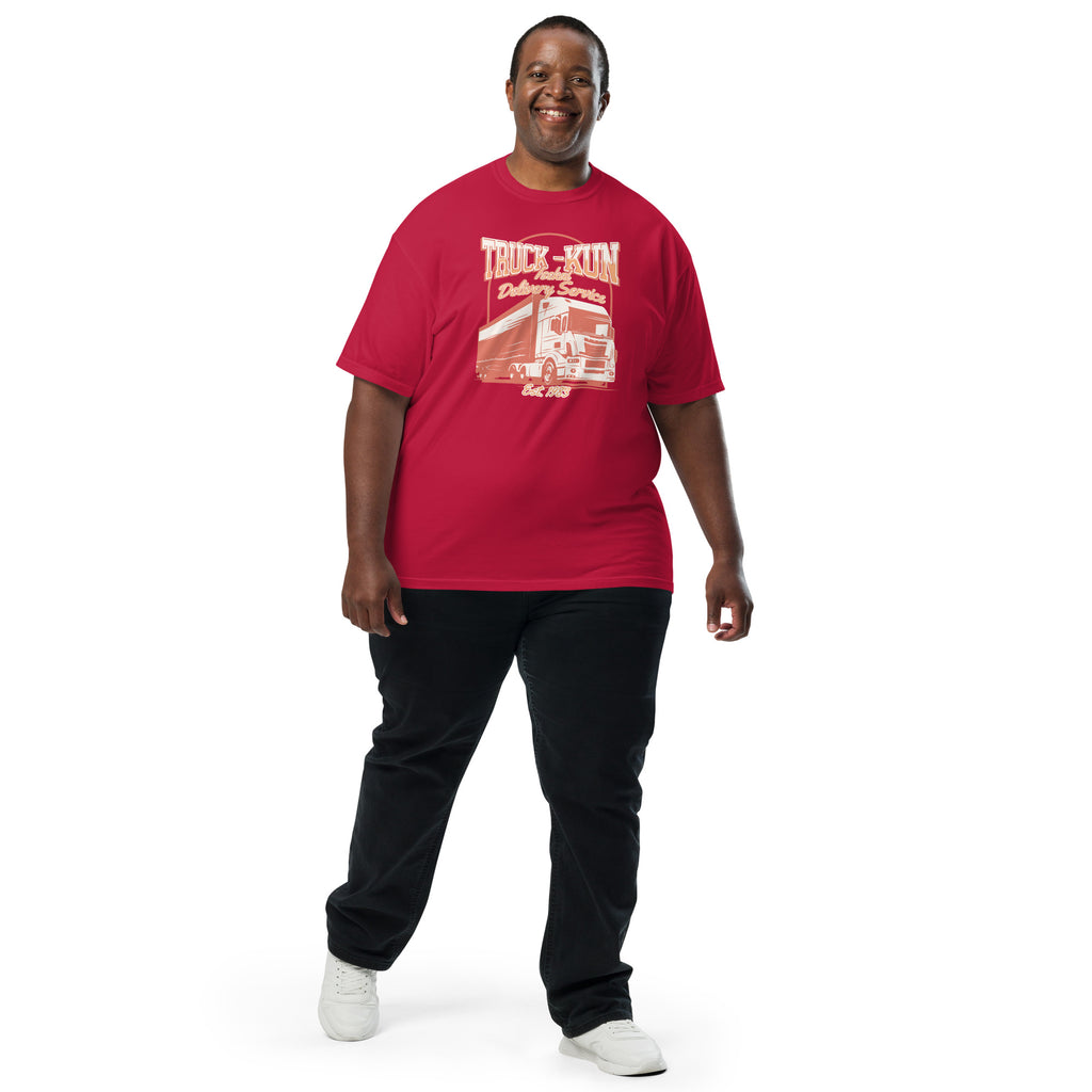 Man wearing a red t-shirt with a 'Truck-kun Isekai Delivery Service' graphic design on a white background