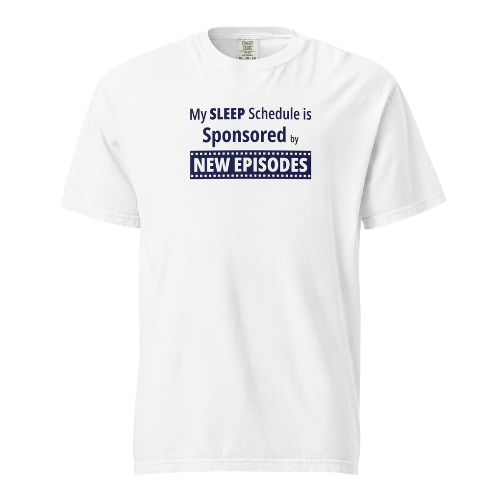 White t-shirt with humorous, funny, witty 'My Sleep Schedule is Sponsored by New Episodes' text design on a white background