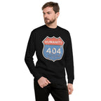 Man wearing a black sweatshirt with a unique 'Humanity 404 Not Found' design on a white background
