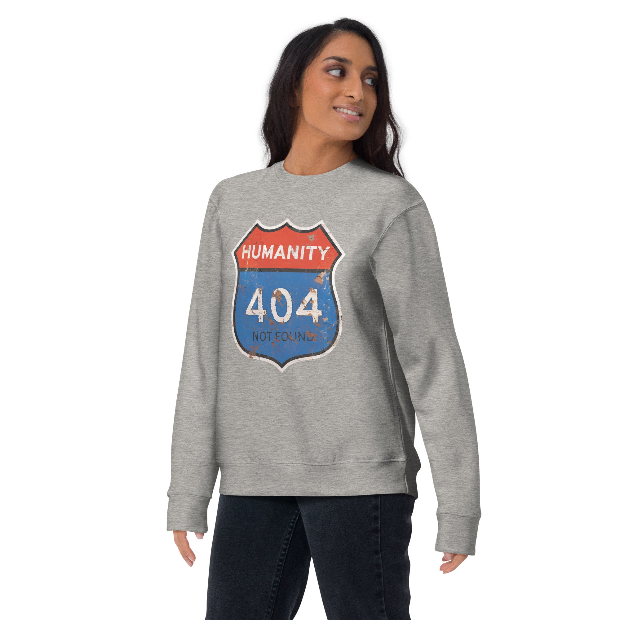 Person wearing a gray sweatshirt with a unique 'Humanity 404 Not Found' design on a white background