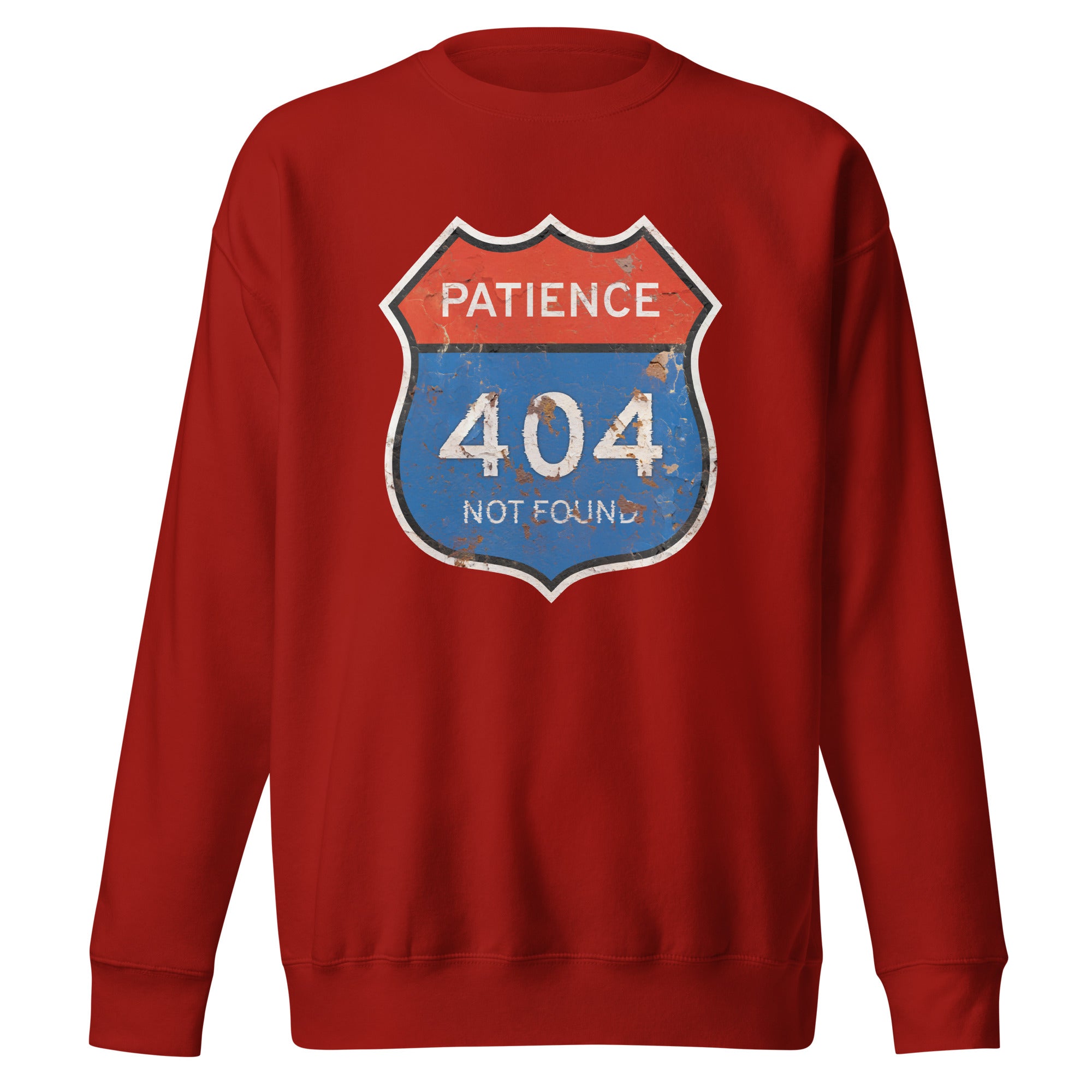 Red sweatshirt with a graphic design of a road sign reading 'Patience 404 Not Found' on a white background.