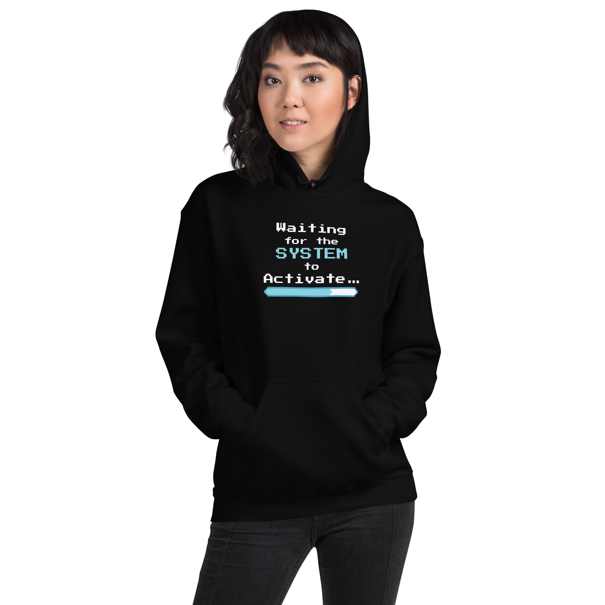 Person wearing a black hoodie with 'Waiting for the System to Activate' text design on a white background