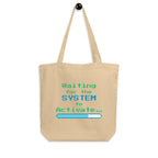 Beige tote bag with text and loading bar design on a white background